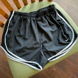 Black Nike shorts, white edge. Used